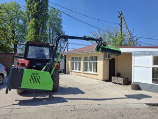 Мульчер на гідравлічній стрілі Мульчер на гідравлічній стрілі фото